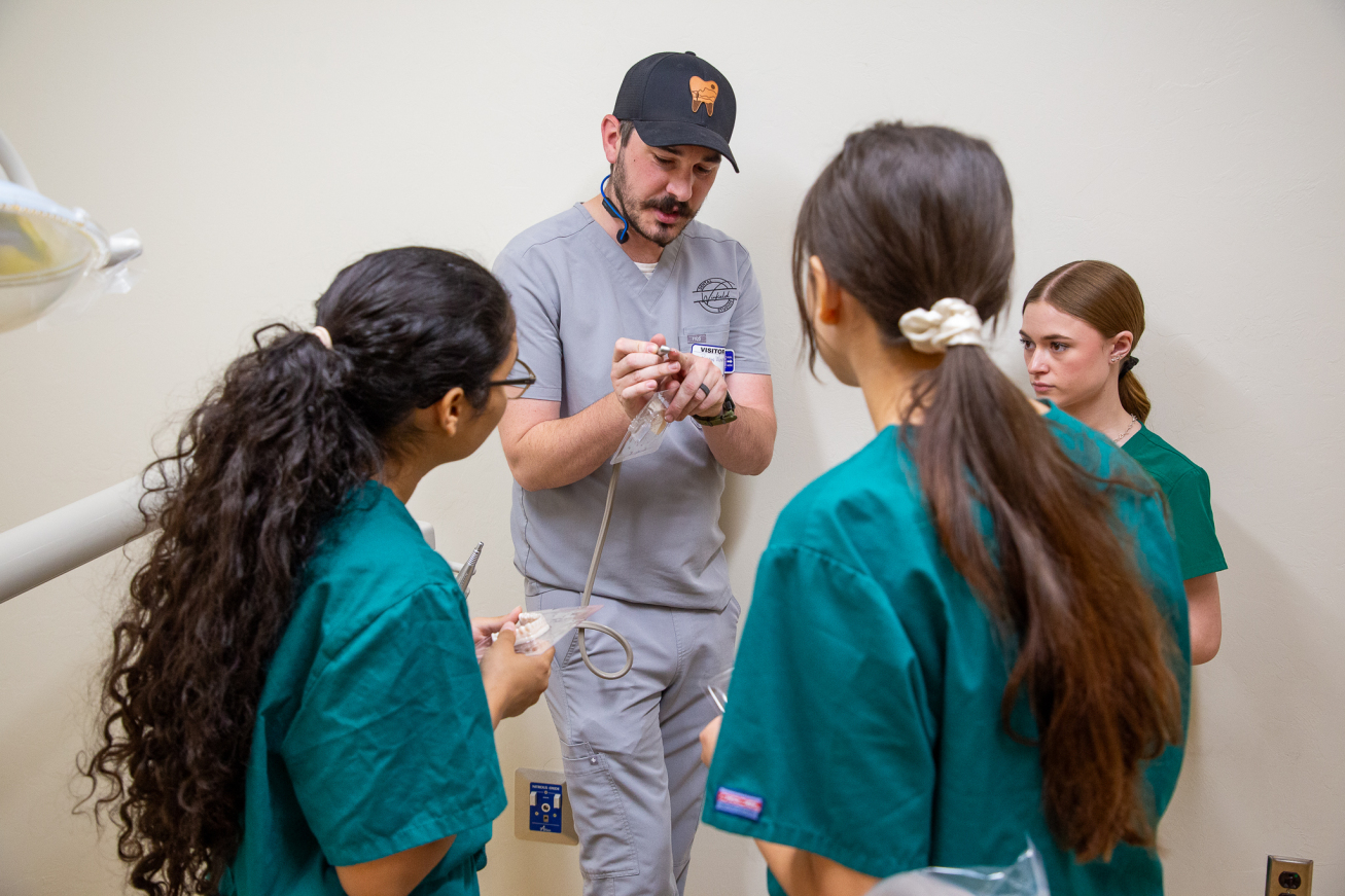 Dr. Ryan Winfield shows dental students the new scanner technology
