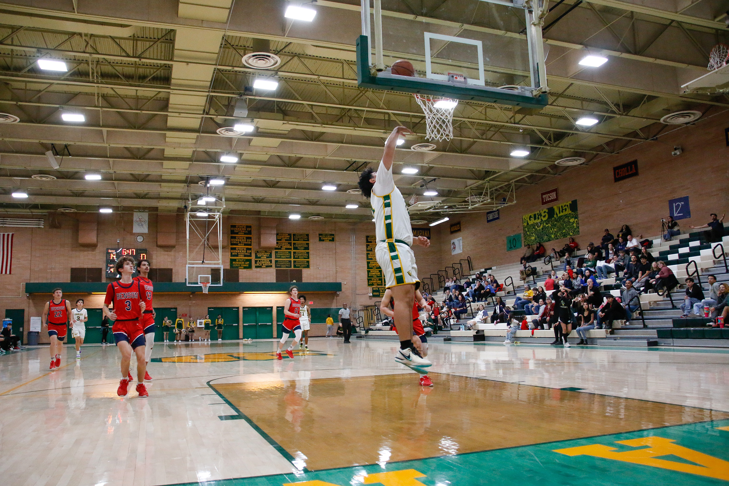 A Santa Rita player shoots a basket