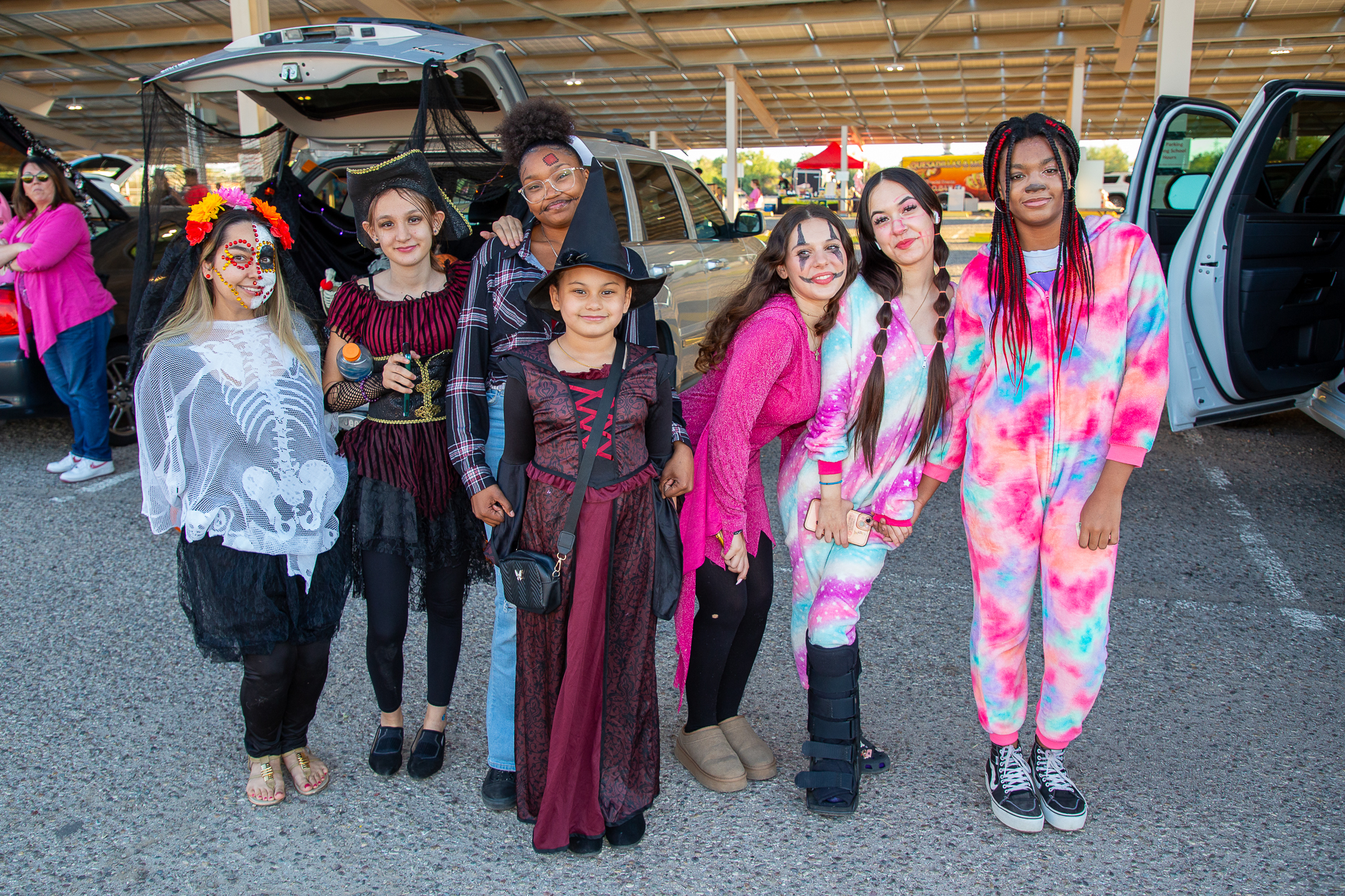 A group of girls show off their Halloween costumes